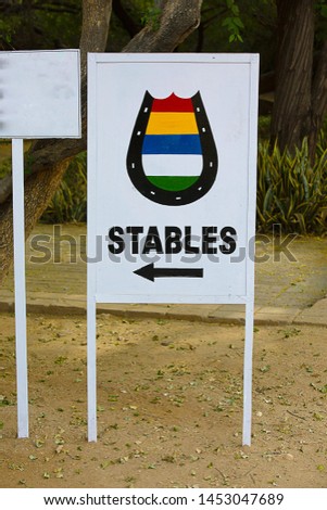 Horse Stable sign indicating Board.