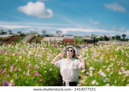 Happiness woman stay outdoor in flower garden under sunlight happiness happy time