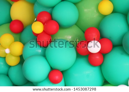 Balloon party background. Colorful balloon in green, yellow, red and white colors. Children birthday party balloon background. Copy space.