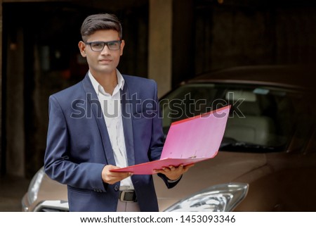 Indian businessman checking the documents
