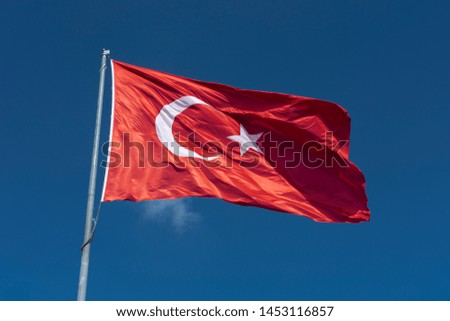 Flag of Turkey. National flag consisting of a red field (background) with a central white star and crescent. 
