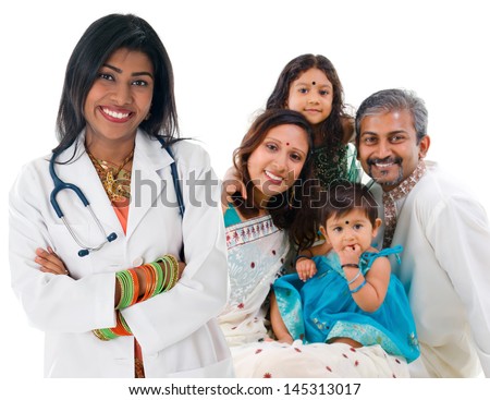 Smiling friendly Indian female medical doctor and patient family. Health care concept. Isolated on white background.