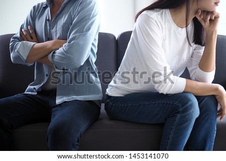 Couples are bored, stressed, upset and irritated after quarreling. Family crisis and relationship problems that come to an end Royalty-Free Stock Photo #1453141070
