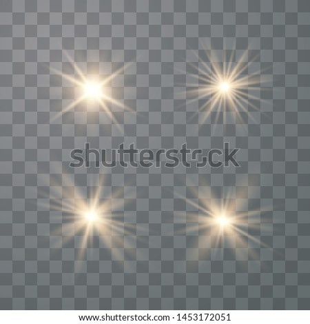 Set of golden glowing lights effects isolated on transparent background. Sun flash with rays and spotlight. Glow light effect.