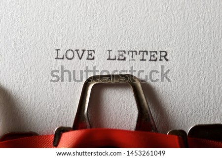 The sentence, Love Letter, written with a typewriter.