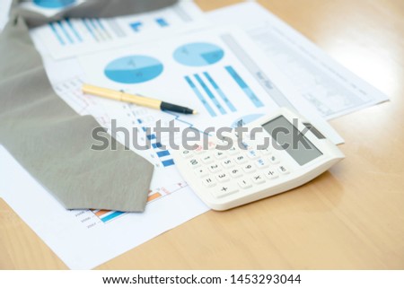 Necktie Graphs Calculator and Pen. Finance Concept
