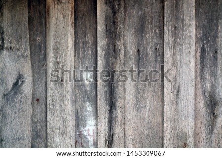 Brown color weathered wooden fence. Abstract background and texture for design.