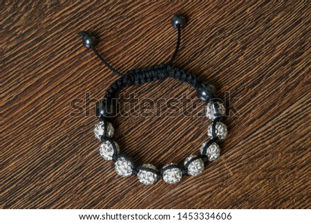 bracelet on the wooden background