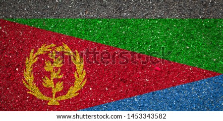 National flag of Eritrea on a stone background.The concept of national pride and symbol of the country.