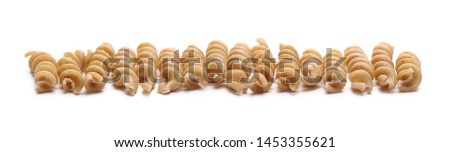 Integral wholemeal pasta, fusilli isolated  on white background