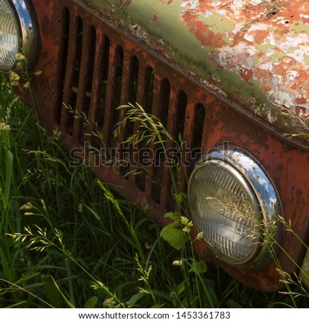  Fragment of an old and abandoned car                       
