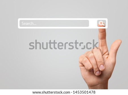 Searching Browsing Internet Data Information Networking Concept,Business man clicking internet search page on computer touch screen,copy space.
    
    - Image Royalty-Free Stock Photo #1453501478