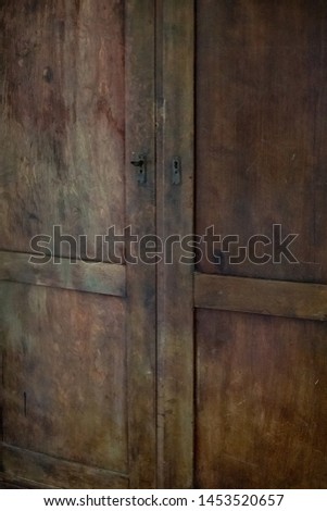 Old brown wooden doors for background. 