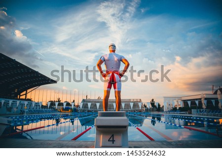 Swimmer standing at the start before swimming training. Swim, concept photo