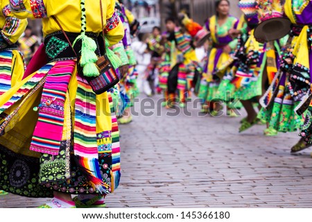 Peruvian dancers at the parade in Cusco. Royalty-Free Stock Photo #145366180