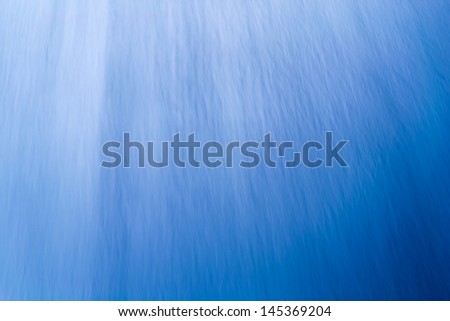 Blue background texture with tiny wrinkles.