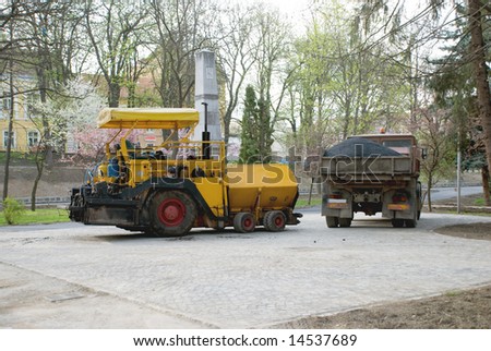 Construction equipment with spring park in background
