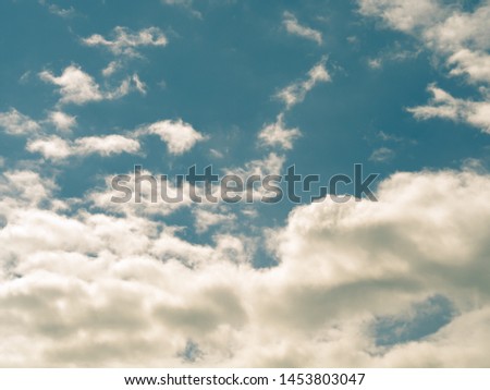 fluffy clouds against the sky, color toning, for banners, illustrations, layouts