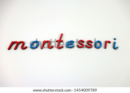 Blue and Red letters spelling out the Word Montessori