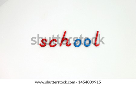 Blue and Red Montessori letters spelling out school