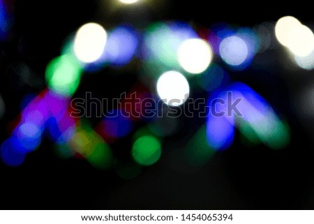 Colorful blurred lights of night urban city surrounding