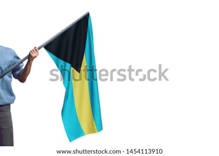 Young man holding Bahamas Flag in White Background, Flag of Bahamas