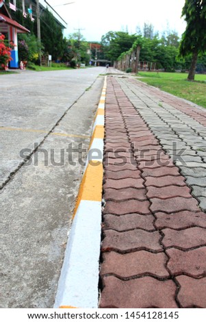 footpath pavement sidewalk with traffic sign