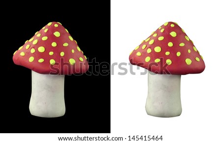Cute red mushroom on black and white background