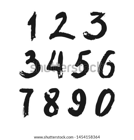 Set of calligraphic numbers painted by black  brush on isolated white background. Lettering for your design. Vector illustration