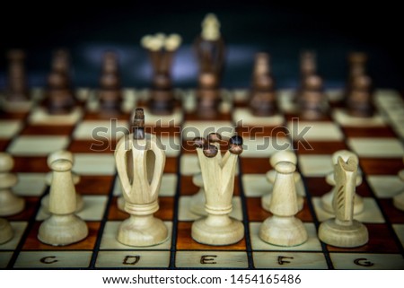 wooden vintage chessboard with chess