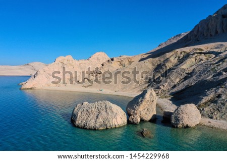 Beautiful aerial view on three monumental rocks at Beritnica beach on Pag Island