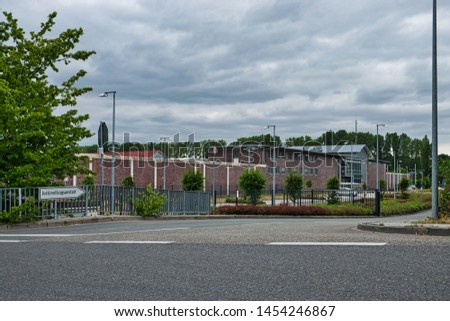 Correctional facility entrance between Ratingen and Dusseldorf in Germany. Translation: correctional facility Royalty-Free Stock Photo #1454246867