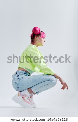 woman with pink hair in profile sat down retro