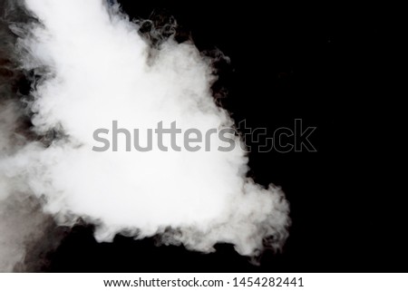 white isolated smoke blowing on dark background 