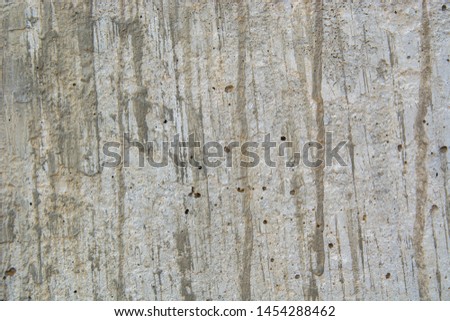 Concrete wall closeup surface texture photography with a lot of variation and different elements