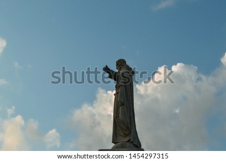 Jesus Christ Statue with Blue Sky Background at Unesco heritage Site Se Cathedral, Old Goa India
