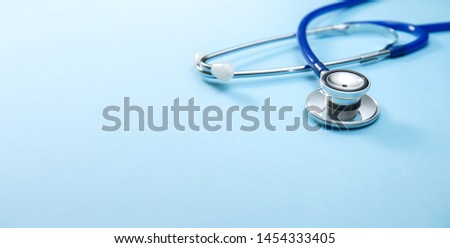 Close-up of a Stethoscope on Blue Background