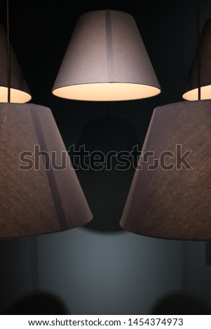 Lamp shades on display, abstract interior detail 