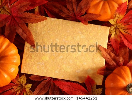 Autumn or thanksgiving greeting card with copy space. (artificial leaves) 