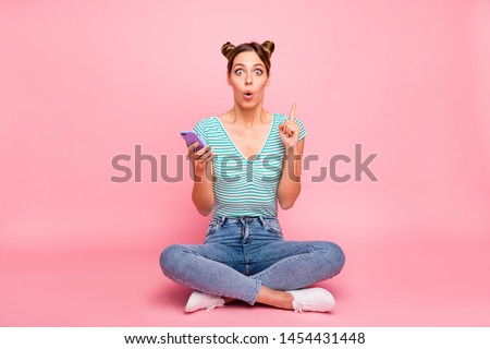 Portrait of her she nice lovely pretty creative charming cute cheerful cheery brainy girl sitting on floor creating new post smm blog cool note isolated over pink pastel background