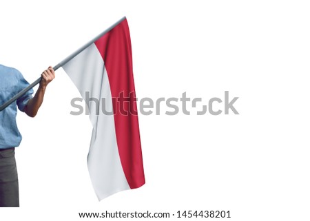 Young man holding Indonesia Flag in White Background, Flag of Indonesia.