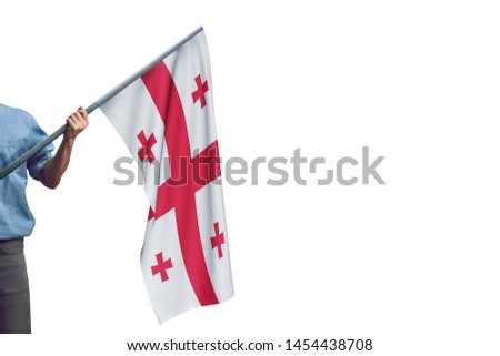 Young man holding Georgia Flag in White Background, Flag of Georgia.