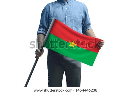 Young man holding Burkina Faso Flag in White Background, Flag of Burkina Faso.