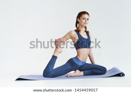 Athletic woman workout pilates exercise fitness lifestyle meditation