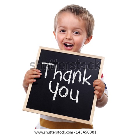 Child holding a thank you sign standing against white background