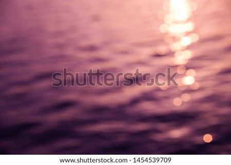 Beautiful sunset or sunrise on the sea with blur and bokeh effect