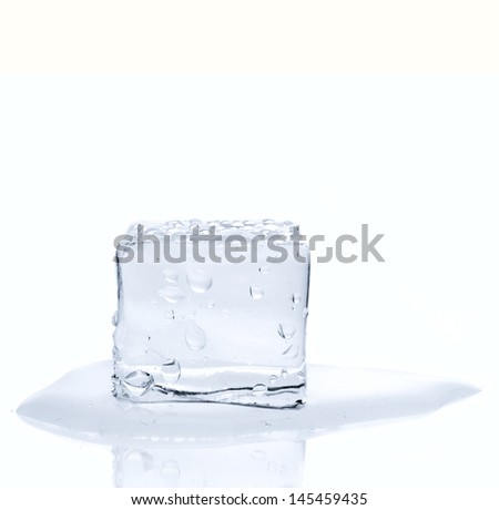 Melting ice cube with water drops isolated on white