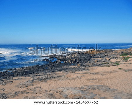 waves stones beach in porto