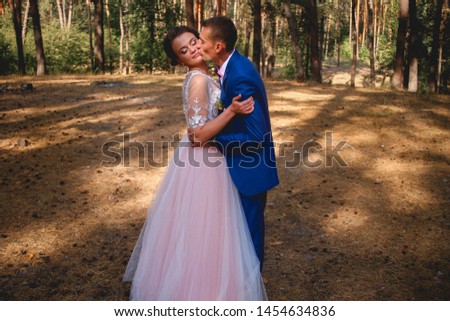 happy romantic wedding couple in autumn  forest 