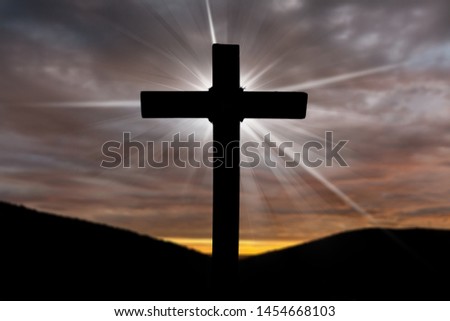 Christ Jesus concept: cross in the morning at sunrise
    
    - Image